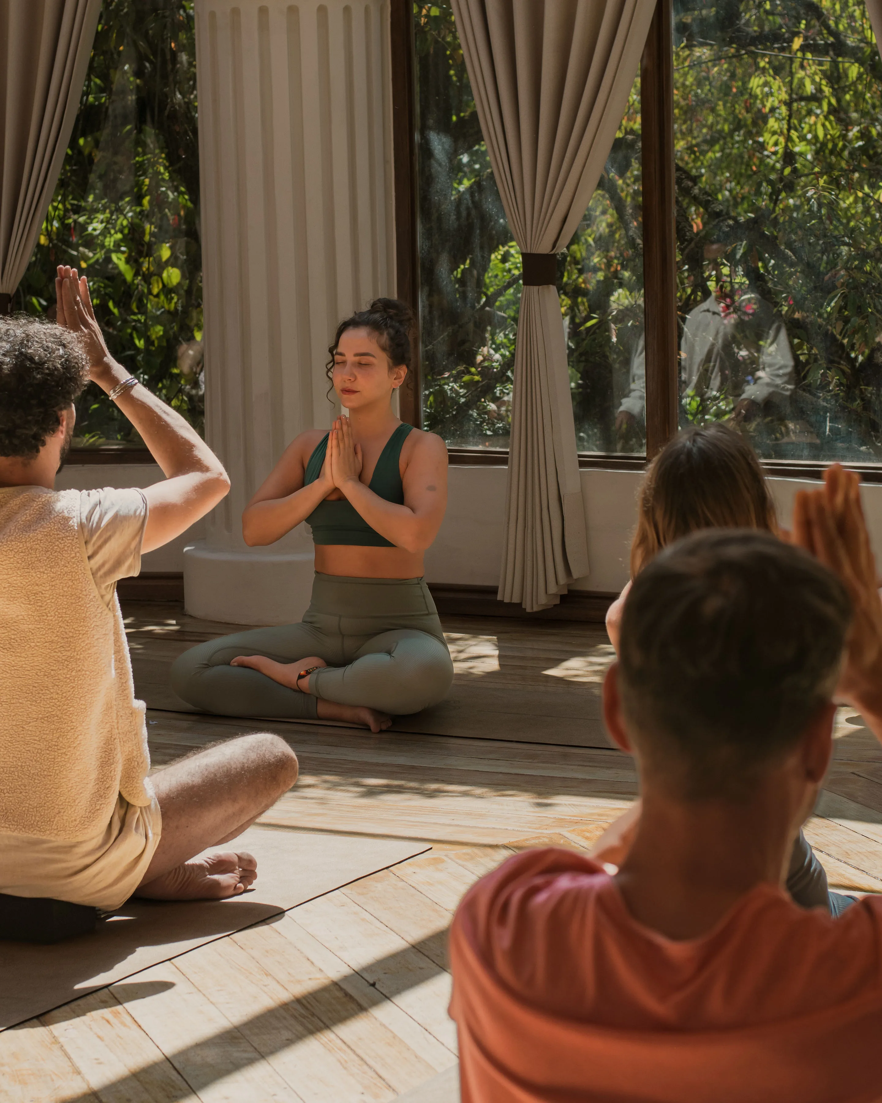 Bodywork session — grounded hands and somatic presence